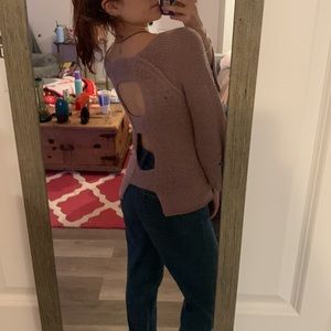 purple sweater with cut out back